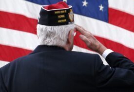 veteran saluting flag