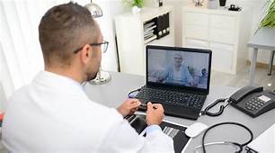 doctor at computer